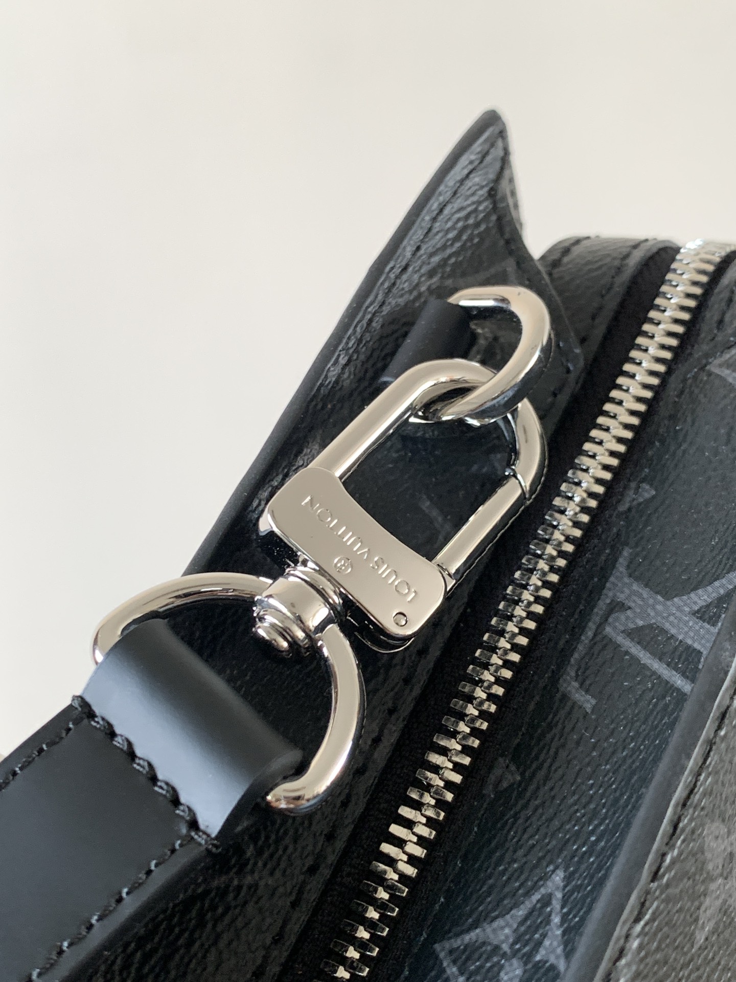 Louis Vuitton The M11742 black floral briefcase with zipper and 163C microcode chip is a Sac Plat 24H handbag with the elegant style of Monogram Eclipse coated canvas.