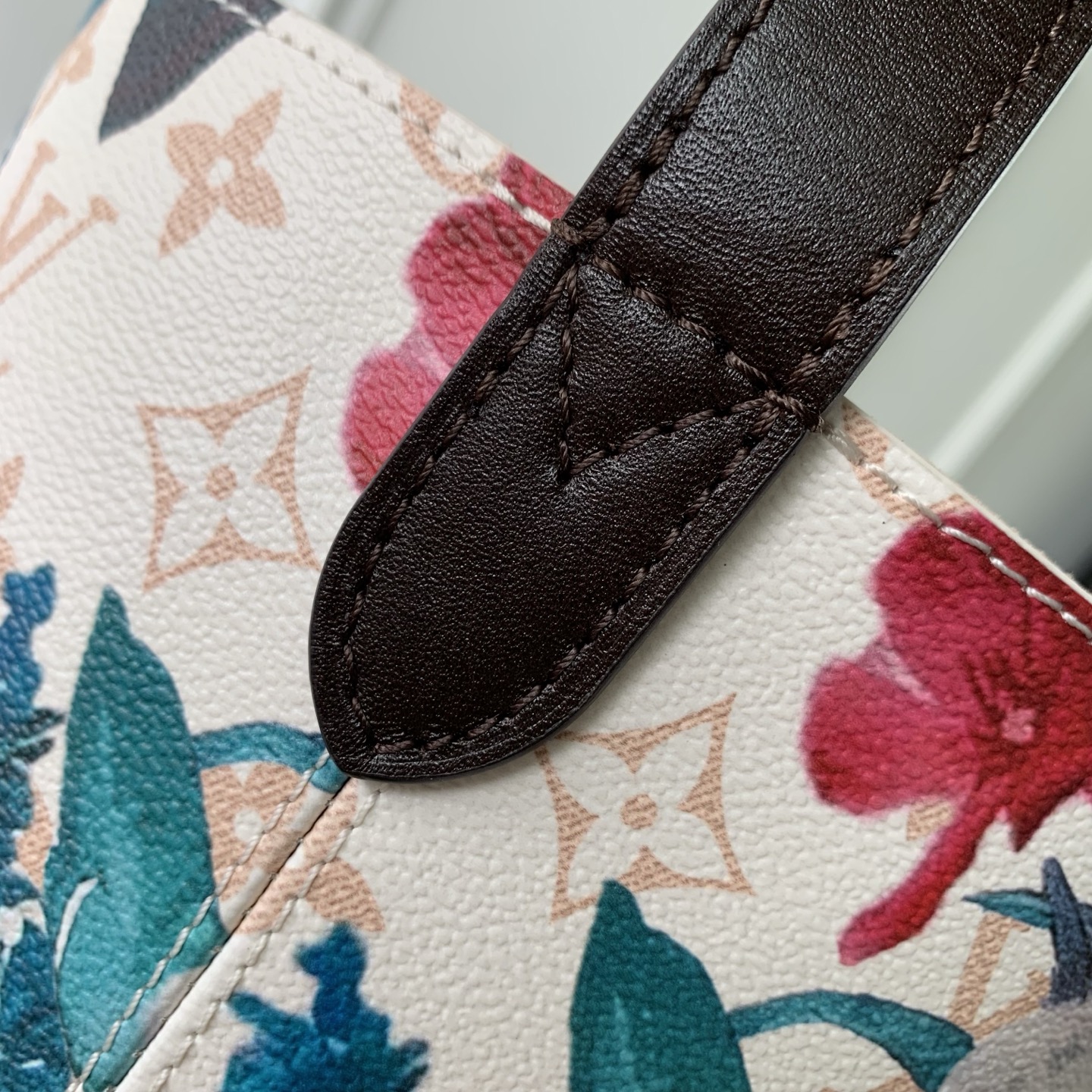 Louis Vuitton The M29067 floral all-in-one BB handbag is from the Monogram Eden collection.