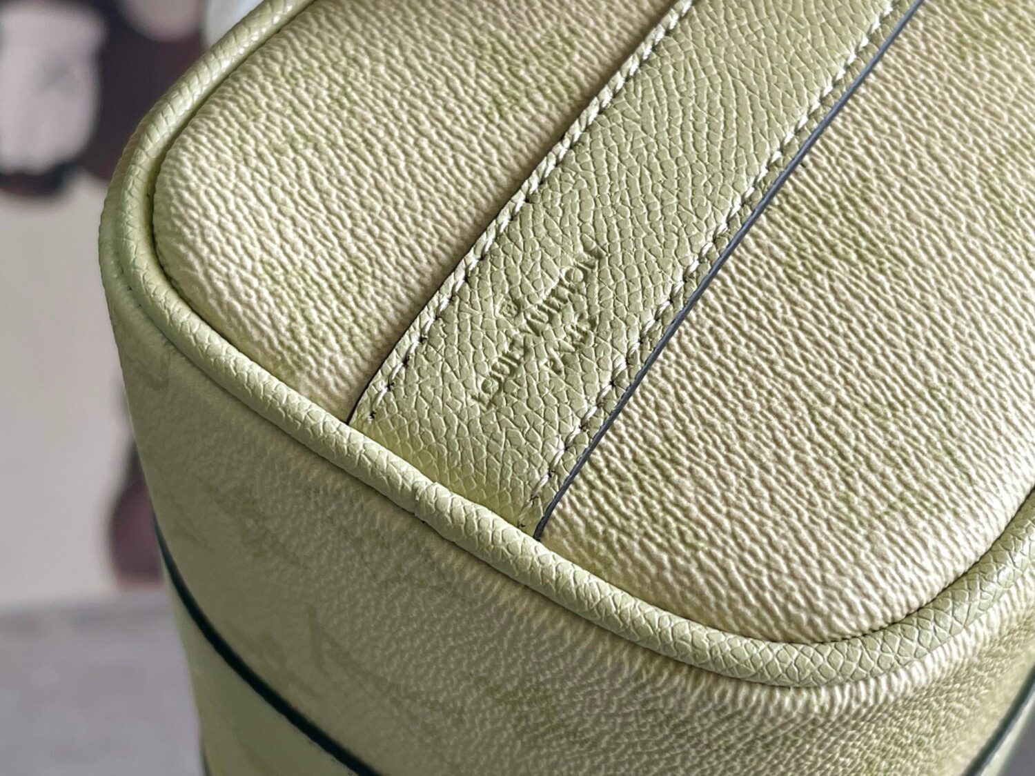 Louis Vuitton M14078 Light Khaki Green Pillow Bag. This Keepall 25 handbag is made of Monogram Eclipse Reverse canvas.